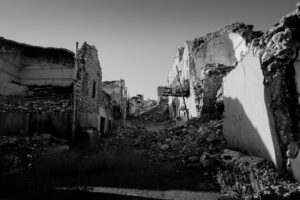 grayscale photo of destroyed buildings