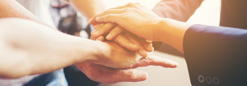 Hands clasped in partnership